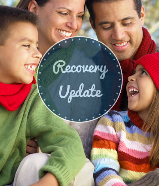 The cover of Recovery Update newsletter: A hispanic family, including parents and two children.