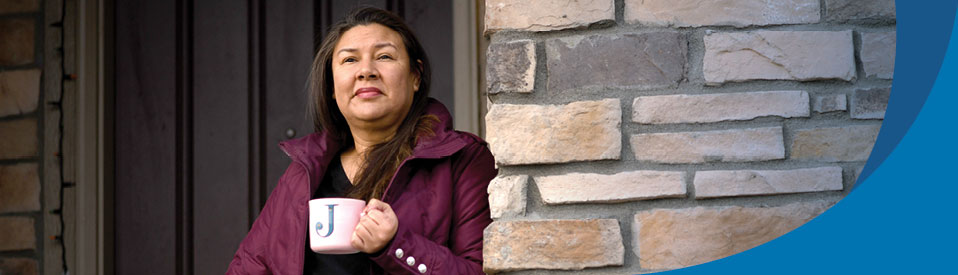 female veteran outside drinking coffee